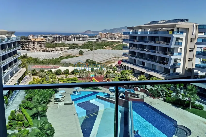 Kupuj  Kompaktowy penthouse 1+1 do wynajęcia w Kargicak z bezpośrednim widokiem na morze i góry C12 16 