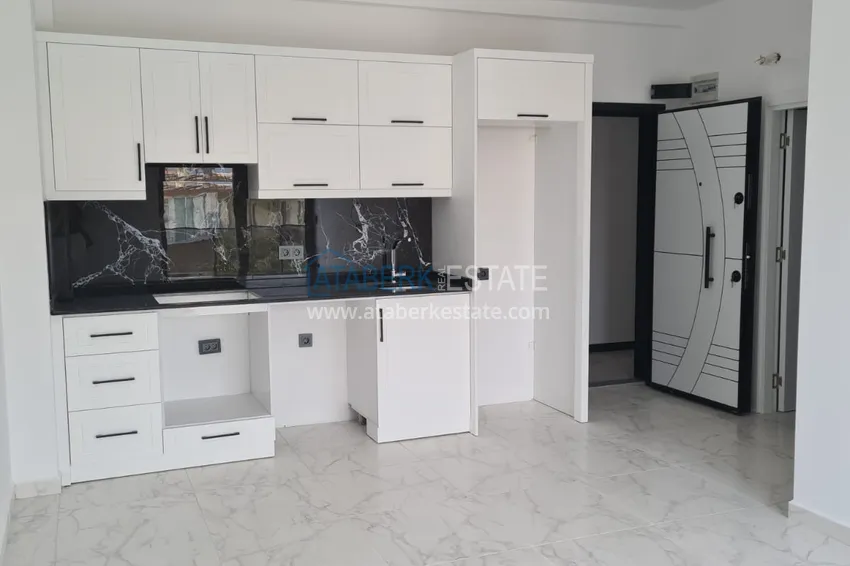 Kupuj  Pilna sprzedaż! Apartament 1+1 z widokiem na góry w nowym kompleksie — Alanya, dzielnica Oba 1 