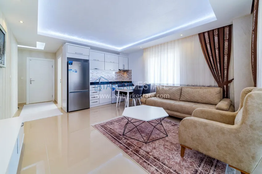 Kupuj  Apartament z jedną sypialnią w Mahmutlar umeblowany z otwartym widokiem na morze  1 