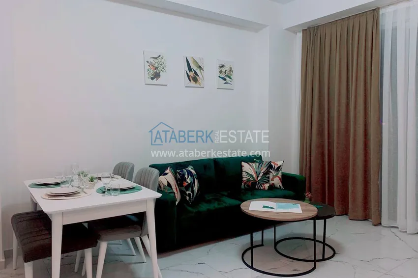 Kupuj  Wynajmij apartament 1+1 z meblami i tarasem w nowym nowoczesnym kompleksie — Alanya, dzielnica Avsallar  2 