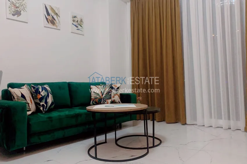 Kupuj  Wynajmij apartament 1+1 z meblami i tarasem w nowym nowoczesnym kompleksie — Alanya, dzielnica Avsallar  3 