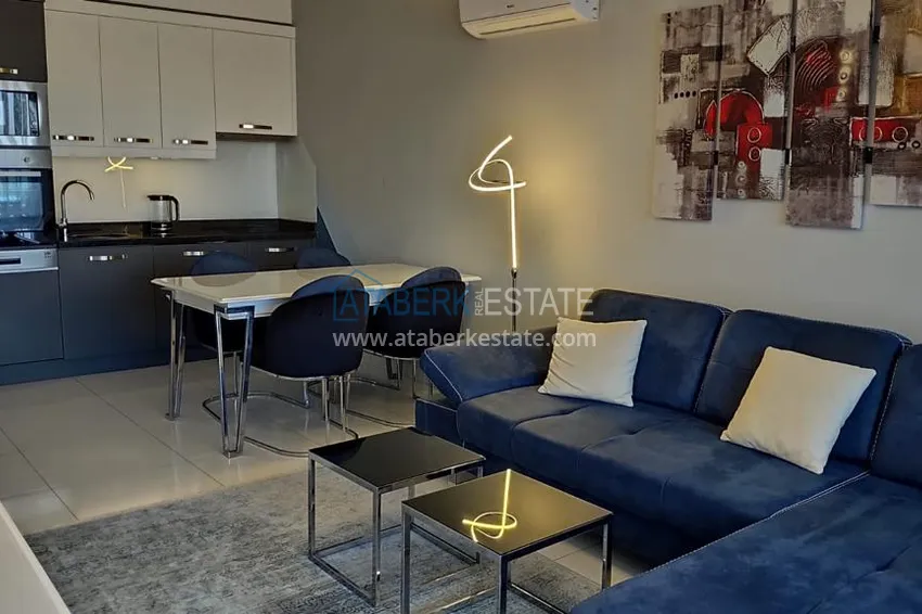 Kupuj  Kompaktowy penthouse 1+1 do wynajęcia w Kargicak z bezpośrednim widokiem na morze i góry C12 4 