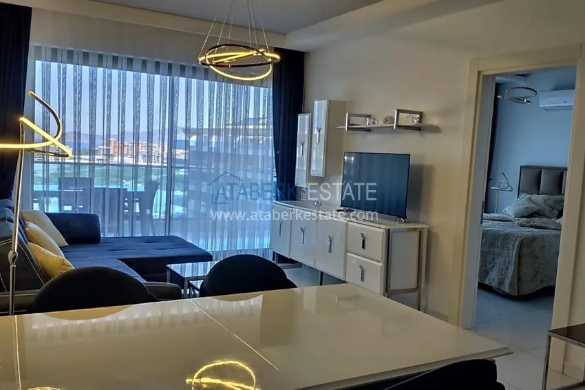 Kupuj  Kompaktowy penthouse 1+1 do wynajęcia w Kargicak z bezpośrednim widokiem na morze i góry C12 5 