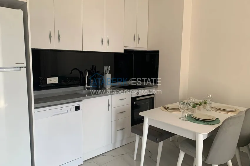 Kupuj  Wynajmij apartament 1+1 z meblami i tarasem w nowym nowoczesnym kompleksie — Alanya, dzielnica Avsallar  5 
