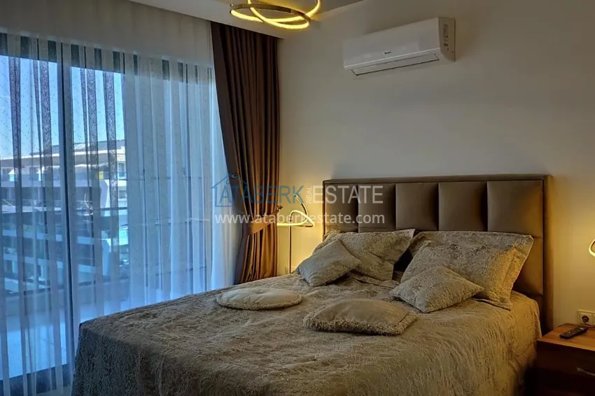 Kupuj  Kompaktowy penthouse 1+1 do wynajęcia w Kargicak z bezpośrednim widokiem na morze i góry C12 9 