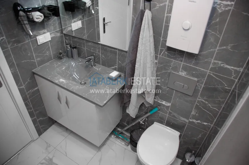 Kupuj  Wynajmij apartament 1+1 z meblami i tarasem w nowym nowoczesnym kompleksie — Alanya, dzielnica Avsallar  9 