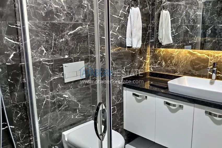 Kupuj  Kompaktowy penthouse 1+1 do wynajęcia w Kargicak z bezpośrednim widokiem na morze i góry C12 10 