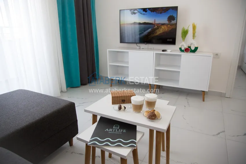 Kupuj  Mieszkanie do wynajęcia w Alanya, dzielnica Avsallar z meblami w kompleksie z prywatną plażą  10 