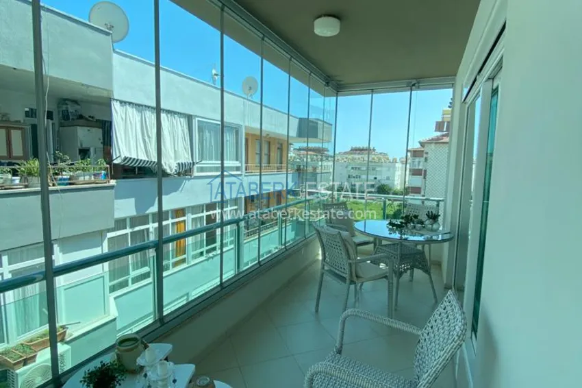 Kupuj  Dwupoziomowy penthouse 3+1 z meblami i przeszklonym balkonem w okolicy Oba. Nieruchomość na zezwolenie na pobyt  12 