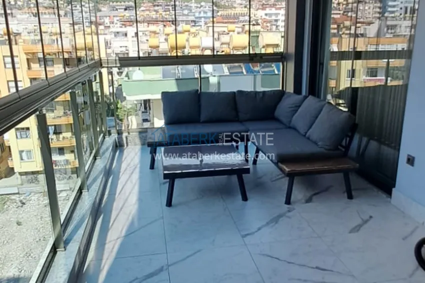 Kupuj  Umeblowany apartament 3+1 z przeszklonym balkonem i widokiem na góry - Centrum Alanya 17 