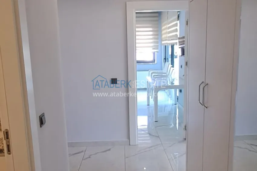 Kupuj  Umeblowany apartament 3+1 z przeszklonym balkonem i widokiem na góry - Centrum Alanya 1 