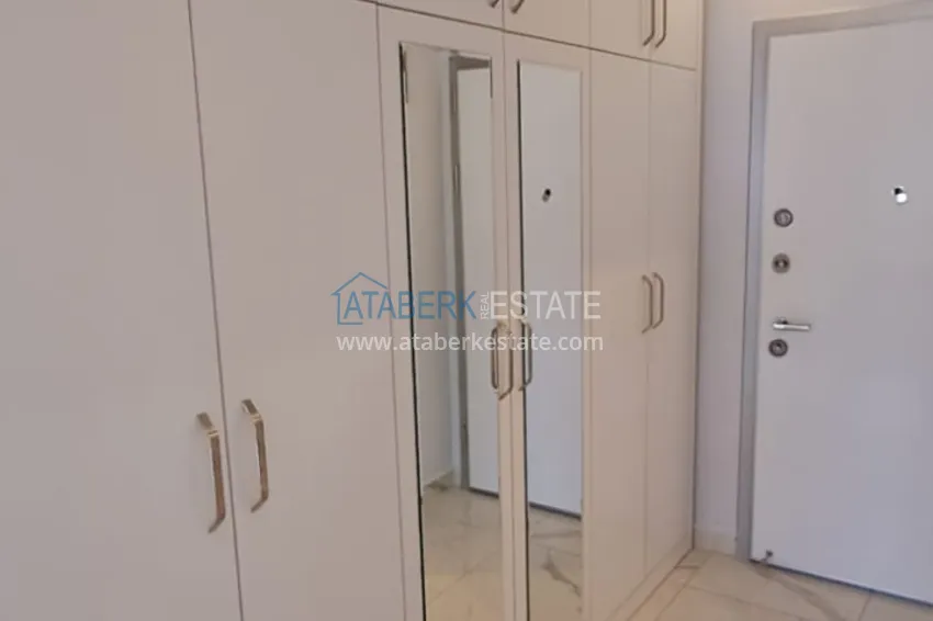 Kupuj  Umeblowany apartament 3+1 z przeszklonym balkonem i widokiem na góry - Centrum Alanya 2 