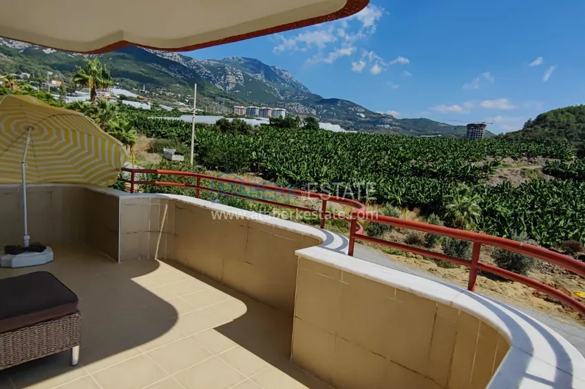 Kupuj  Panoramiczny apartament z dwiema sypialniami i meblami, przeszklony balkon w Mahmutlar 26 