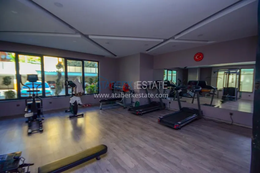 Umeblowany apartament 3+1 z przeszklonym balkonem i widokiem na góry - Centrum Alanya 7 