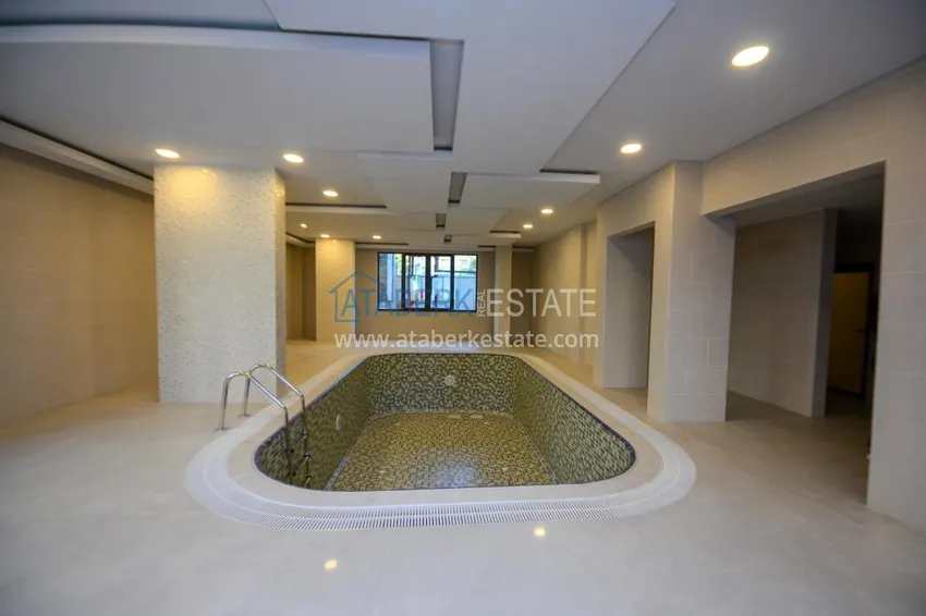Umeblowany apartament 3+1 z przeszklonym balkonem i widokiem na góry - Centrum Alanya 9 