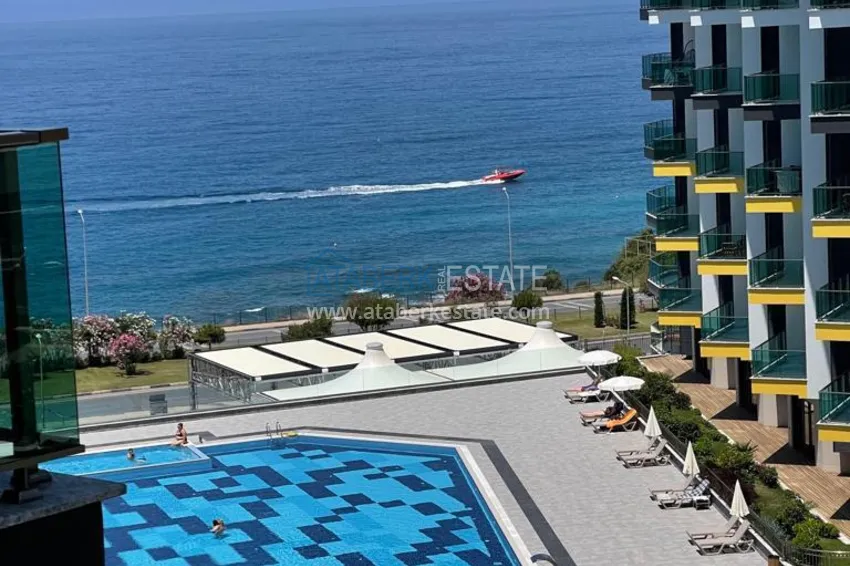 Kupuj  Umeblowane mieszkanie 1+1 w kompleksie nad brzegiem morza — Alanya, dzielnica Kargicak 11 