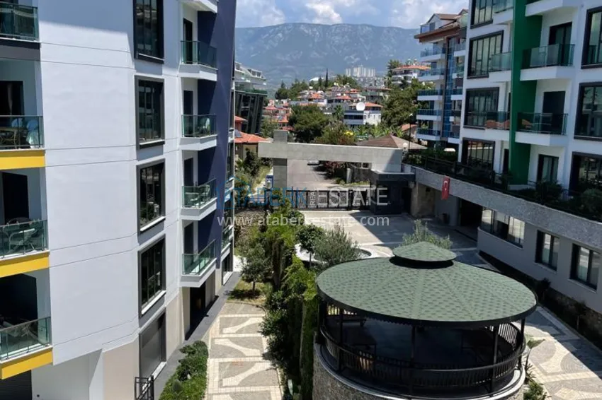 Kupuj  Umeblowane mieszkanie 1+1 w kompleksie nad brzegiem morza — Alanya, dzielnica Kargicak 12 