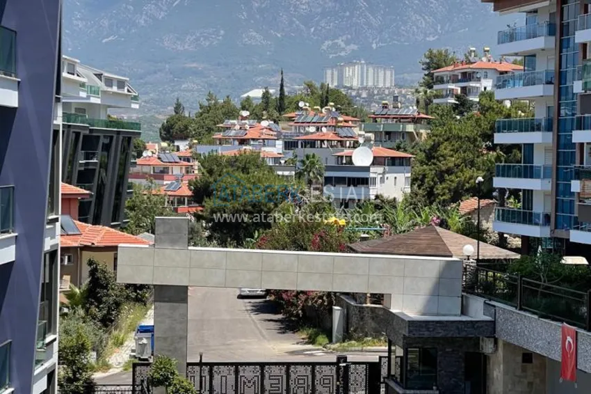 Kupuj  Umeblowane mieszkanie 1+1 w kompleksie nad brzegiem morza — Alanya, dzielnica Kargicak 13 