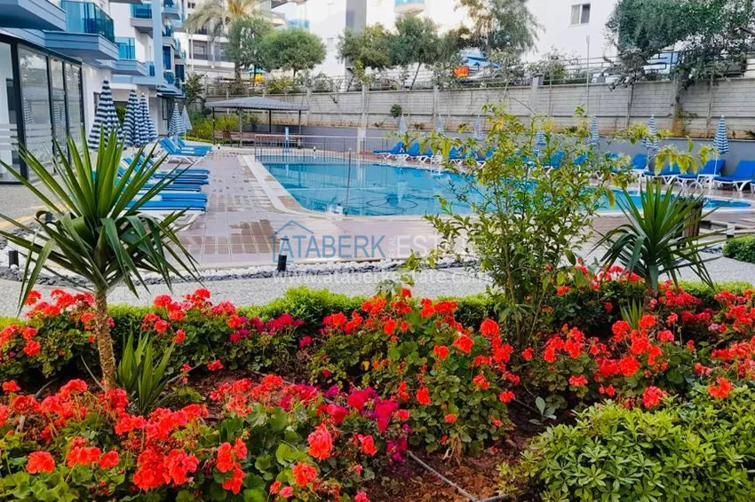 Nowo umeblowane mieszkanie z przeszklonym balkonem w nowoczesnym kompleksie - dzielnica Oba, Alanya 1 