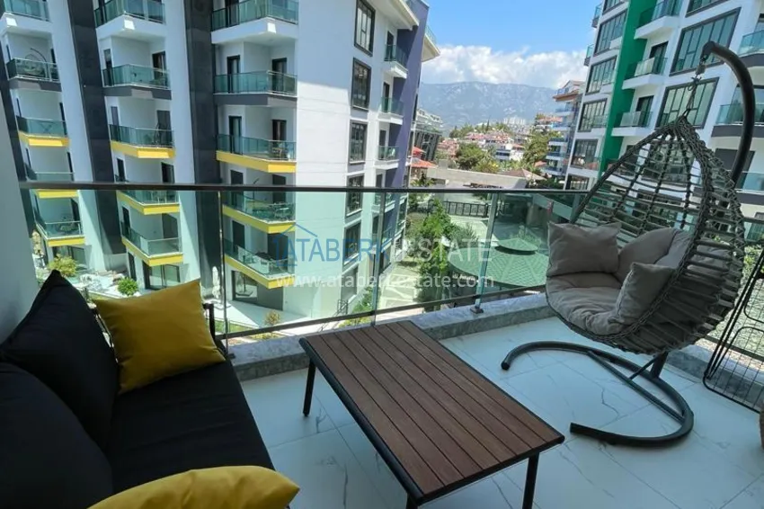 Kupuj  Umeblowane mieszkanie 1+1 w kompleksie nad brzegiem morza — Alanya, dzielnica Kargicak 9 