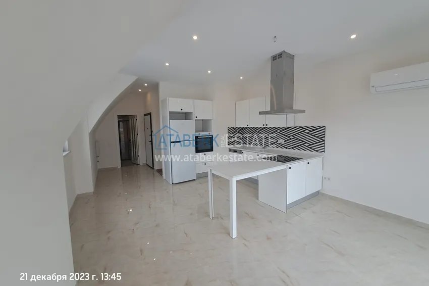 Kupuj  Apartament dwupoziomowy w centrum Alanyi, 200 metrów od plaży Kleopatra 1 