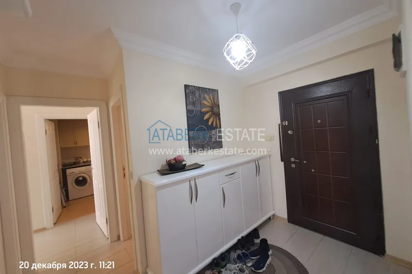 Kupuj  Dwupokojowy apartament z meblami, widokiem na morze i góry 250 metrów od wybrzeża — dzielnica Mahmutlar 1 