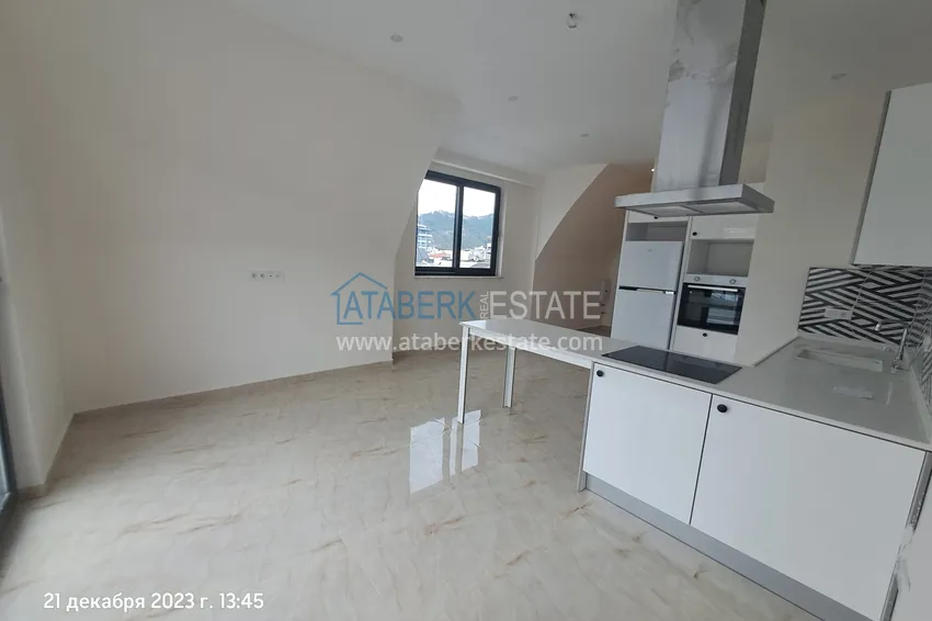 Kupuj  Apartament dwupoziomowy w centrum Alanyi, 200 metrów od plaży Kleopatra 2 