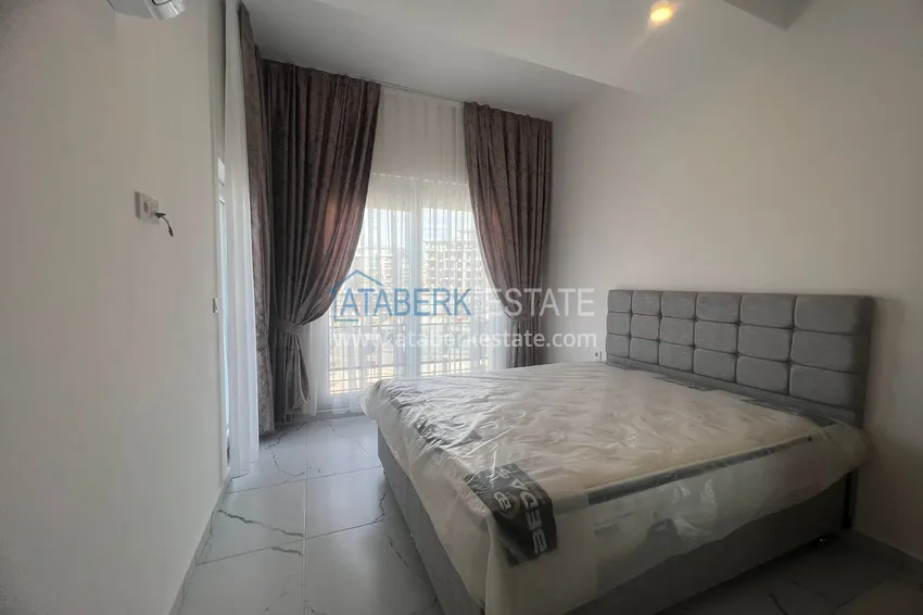 Kupuj  Apartament z jedną sypialnią z widokiem na morze w Avsallar w nowoczesnej rezydencji. Nadaje się do wynajmu krótkoterminowego  4 