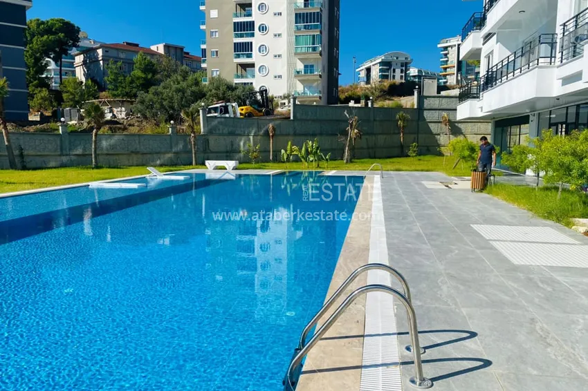 1+1 umeblowane mieszkanie w nowym kompleksie mieszkalnym, dzielnica Avsallar — Alanya. Nadaje się do wynajmu krótkoterminowego  6 