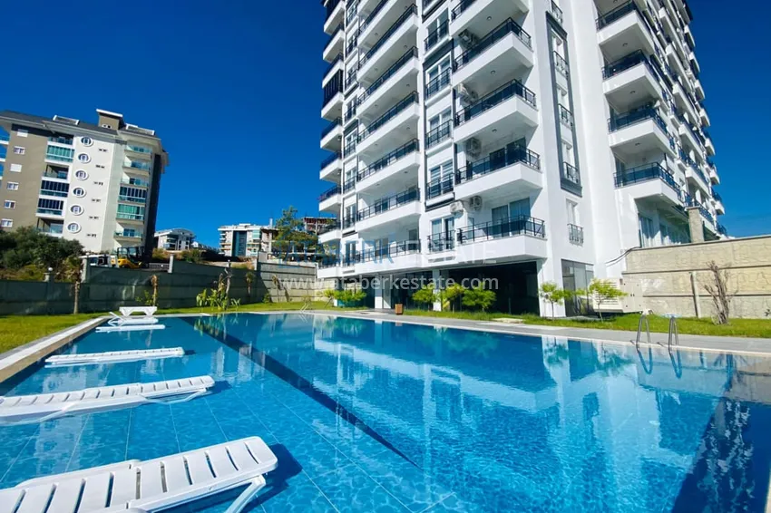 1+1 umeblowane mieszkanie w nowym kompleksie mieszkalnym, dzielnica Avsallar — Alanya. Nadaje się do wynajmu krótkoterminowego  7 