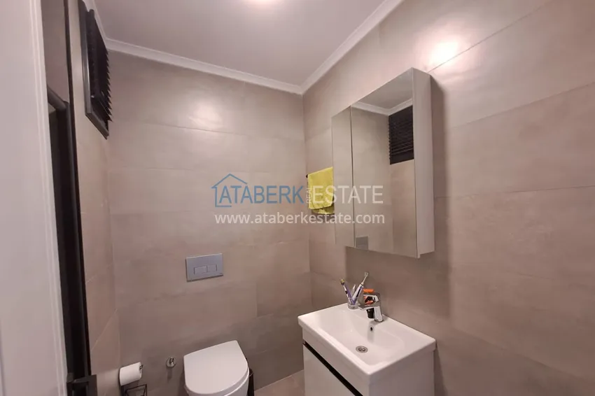 Kupuj  Umeblowany apartament z dwiema sypialniami 200 metrów od morza — Alanya, dzielnica Mahmutlar 11 