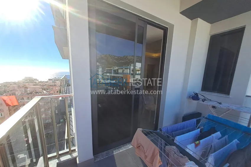 Kupuj  Umeblowany apartament z dwiema sypialniami 200 metrów od morza — Alanya, dzielnica Mahmutlar 14 