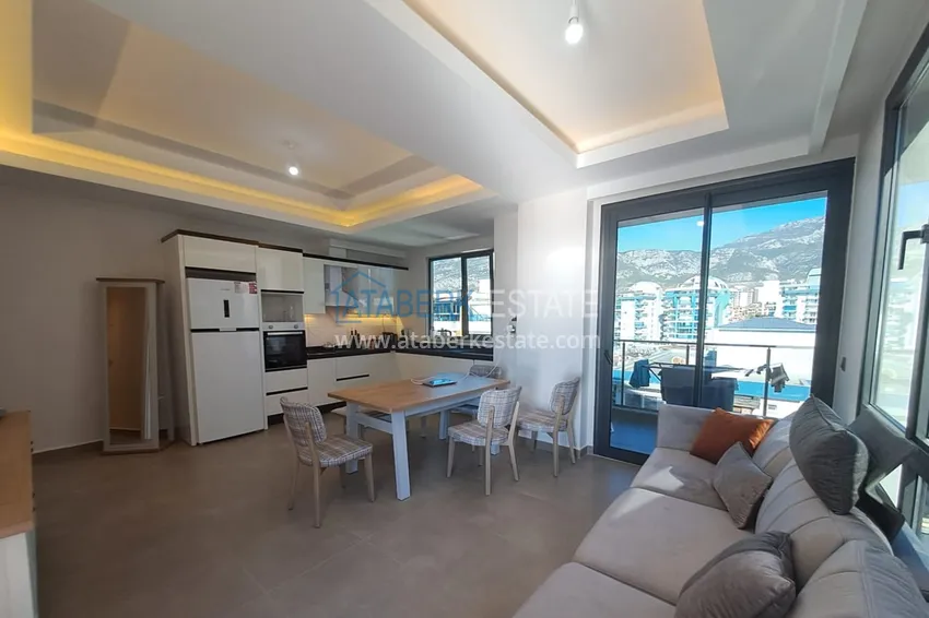 Kupuj  Umeblowany apartament z dwiema sypialniami 200 metrów od morza — Alanya, dzielnica Mahmutlar 1 