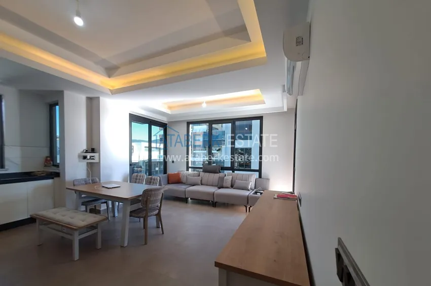 Kupuj  Umeblowany apartament z dwiema sypialniami 200 metrów od morza — Alanya, dzielnica Mahmutlar 3 