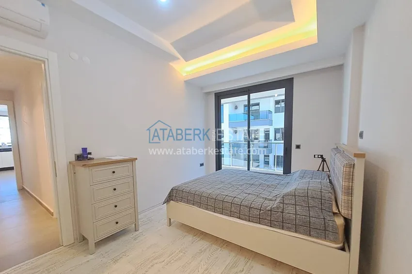 Kupuj  Umeblowany apartament z dwiema sypialniami 200 metrów od morza — Alanya, dzielnica Mahmutlar 7 