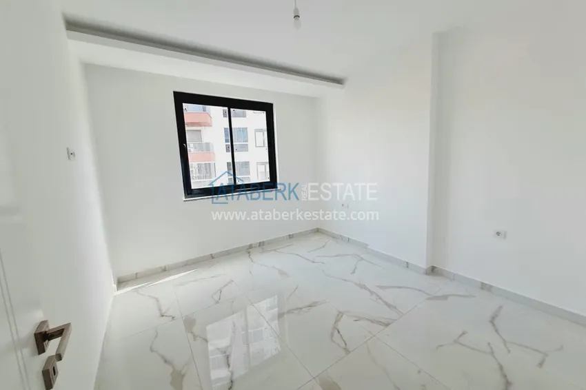 Kupuj  1+1 mieszkanie od właściciela w nowym kompleksie mieszkalnym - dzielnica Mahmutlar, Alanya, 52 m2, 4 piętro 13 