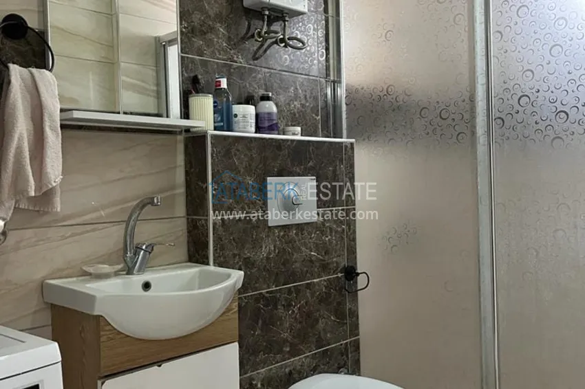 Kupuj  Umeblowany apartament z jedną sypialnią 300 metrów od morza - centrum Alanyi, plaża Kleopatra  13 
