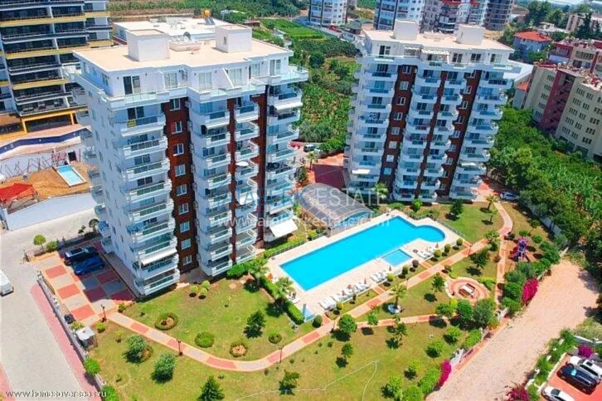 Apartament 1+1 z meblami i przeszklonym balkonem 450 metrów od morza — Mahmutlar, Alanya 1 