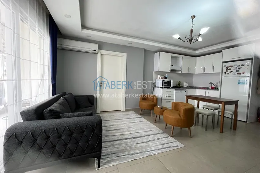 Kupuj  Umeblowany apartament z jedną sypialnią 300 metrów od morza - centrum Alanyi, plaża Kleopatra  1 