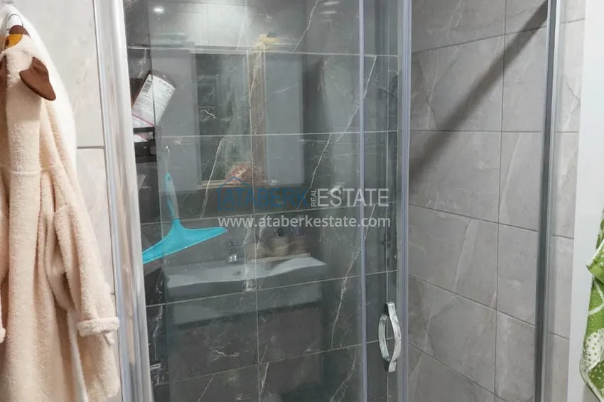 Kupuj Apartament pod klucz z 1 sypialnią i przeszklonym balkonem w Alanya w dzielnicy Avsallar. Dostępna jest rata 16