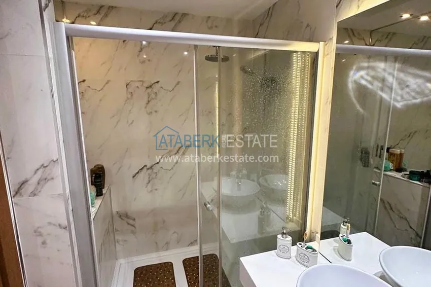 Kupuj  Stylowy apartament liniowy 3+1 z panoramicznym widokiem w malowniczym zakątku Alanyi — dzielnicy Mahmutlar 10 