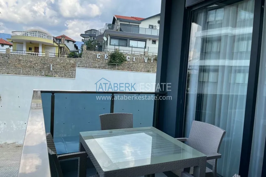 Kupuj  Umeblowany apartament z widokiem na morze w okolicy Kargicak, Alanya 12 