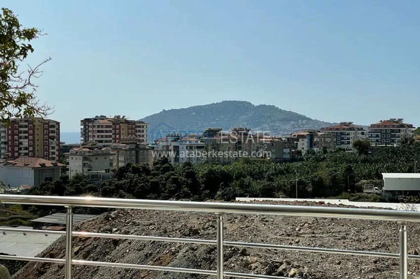 Kupuj  Umeblowany dwupoziomowy penthouse z widokiem na morze i góry — Alanya, dzielnica Cikcilli 42 