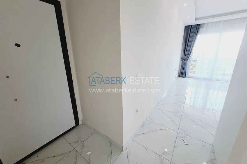 Kupuj  Umeblowany nowy apartament z meblami i widokiem na góry - dzielnica Oba, Alanya 1 