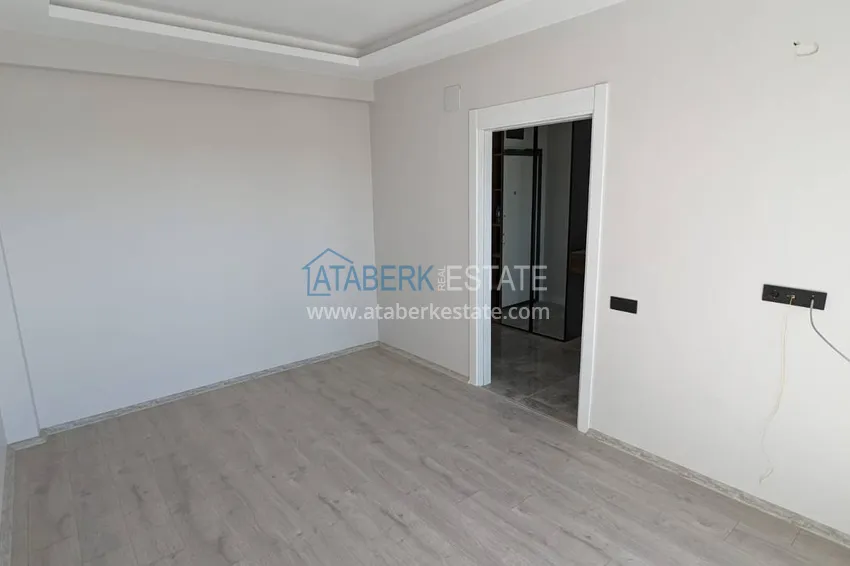 Kupuj  Apartament z jedną sypialnią z pięknym wykończeniem i widokiem na góry w dzielnicy Tomyuk, Mersin. Rata jest możliwa 10 
