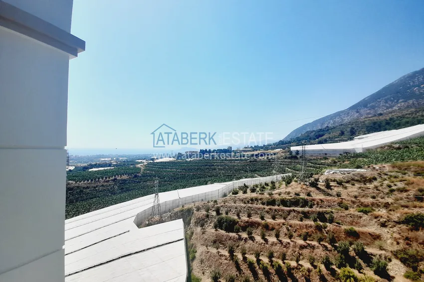 Kupuj  Oferta inwestorska: Apartament z jedną sypialnią i widokiem na góry w kompleksie premium — Alanya, Mahmutlar 11 