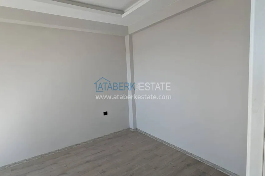 Kupuj  Apartament z jedną sypialnią z pięknym wykończeniem i widokiem na góry w dzielnicy Tomyuk, Mersin. Rata jest możliwa 11 