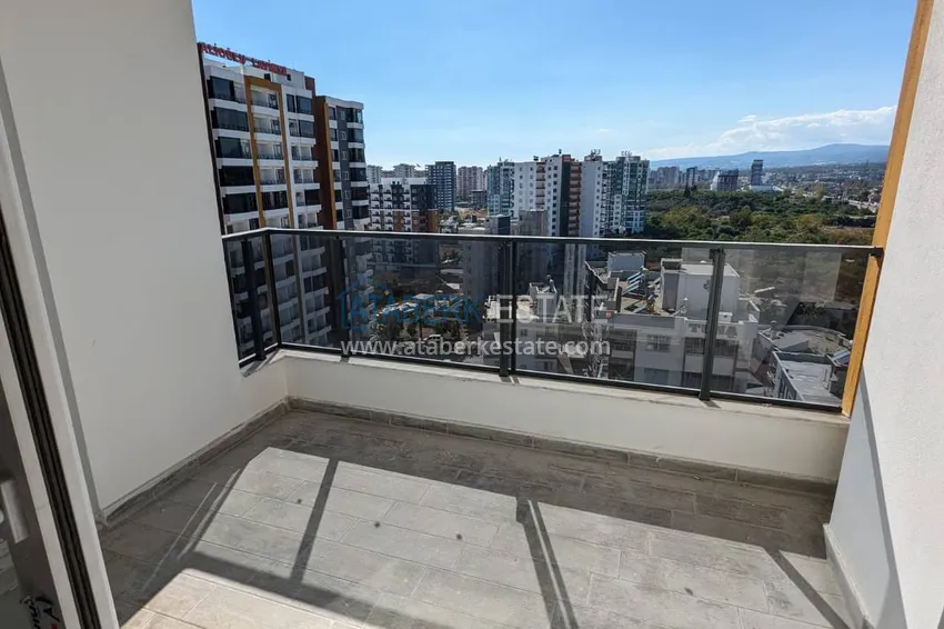 Kupuj  Apartament z jedną sypialnią z pięknym wykończeniem i widokiem na góry w dzielnicy Tomyuk, Mersin. Rata jest możliwa 14 