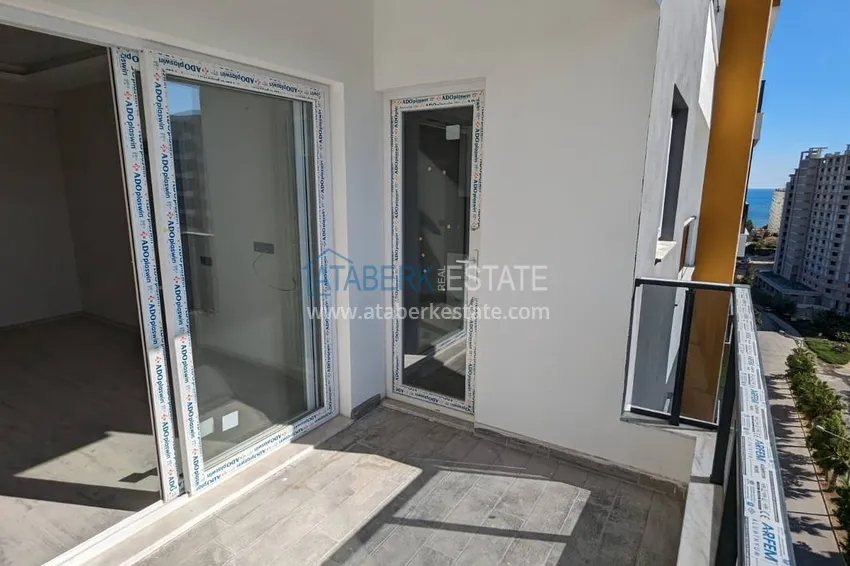 Kupuj  Apartament z jedną sypialnią z pięknym wykończeniem i widokiem na góry w dzielnicy Tomyuk, Mersin. Rata jest możliwa 15 