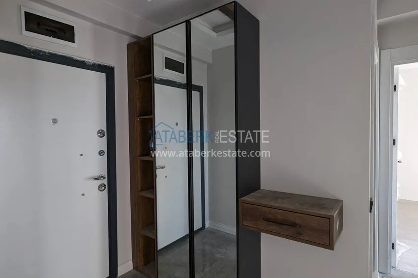 Kupuj  Apartament z jedną sypialnią z pięknym wykończeniem i widokiem na góry w dzielnicy Tomyuk, Mersin. Rata jest możliwa 1 